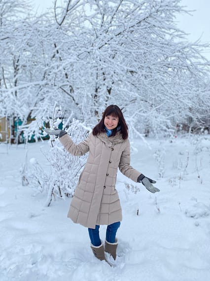 Trees covered in snow and beautiful girl