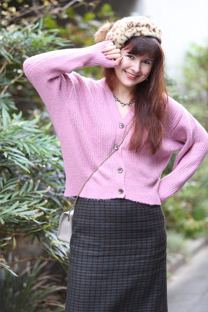 beaufitul girl in pink knit sweater